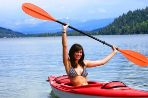 Happy woman on a kayak