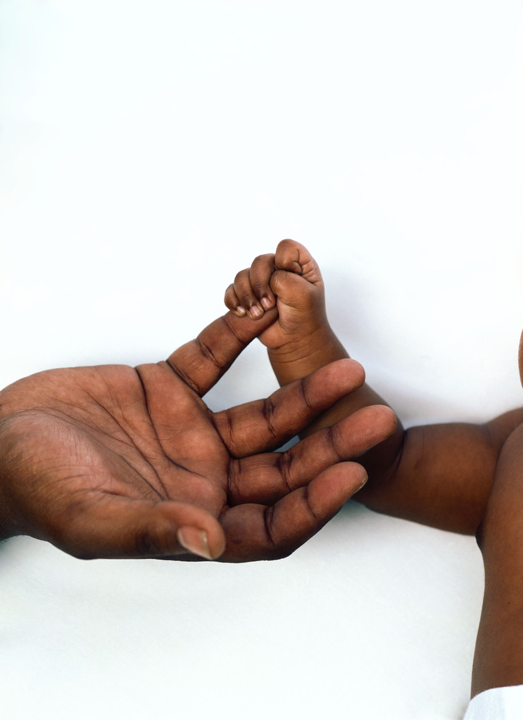 Baby Holding an Adult's Finger